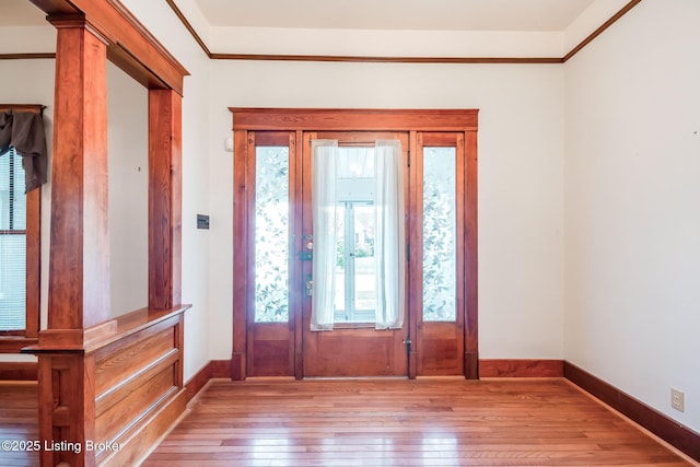 4714 Burkley Ave, Louisville, KY 40214 - entryway with wood-type flooring, baseboards, and ornamental molding