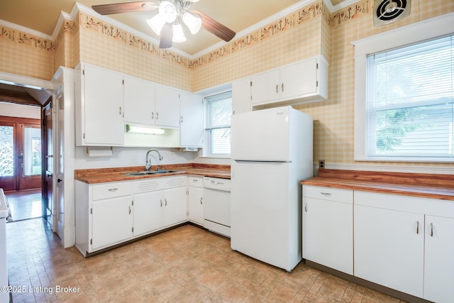 4714 Burkley Ave, Louisville, KY 40214 - kitchen with white appliances, a sink, wallpapered walls, ceiling fan, and crown molding