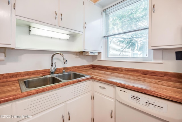 4714 Burkley Ave, Louisville, KY 40214 - kitchen featuring white dishwasher, a sink, white cabinetry, and wooden counters