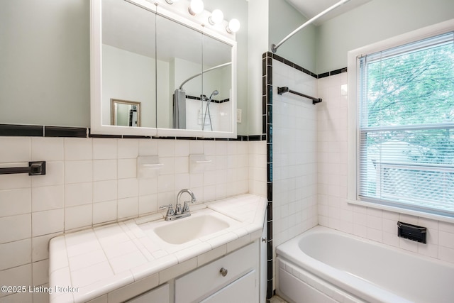 4714 Burkley Ave, Louisville, KY 40214 - bathroom with vanity, healthy amount of natural light, and tasteful backsplash
