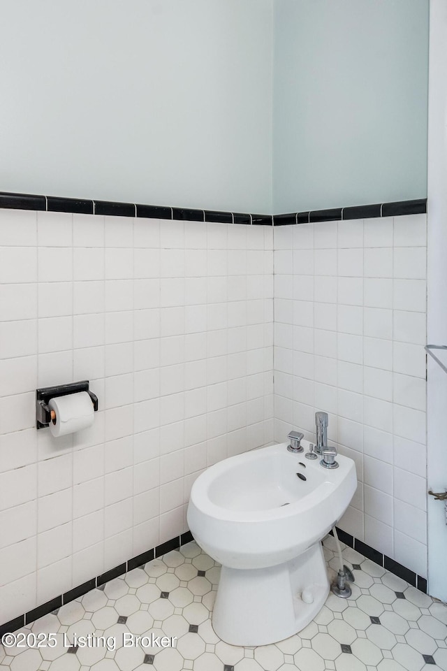 4714 Burkley Ave, Louisville, KY 40214 - bathroom with tile walls and a bidet