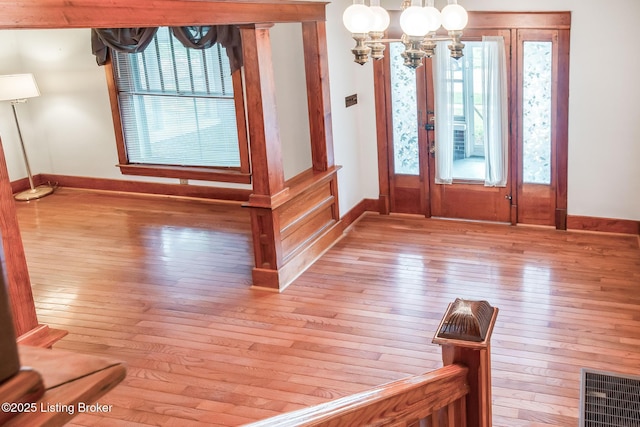 4714 Burkley Ave, Louisville, KY 40214 - foyer entrance with a chandelier, hardwood / wood-style flooring, and plenty of natural light