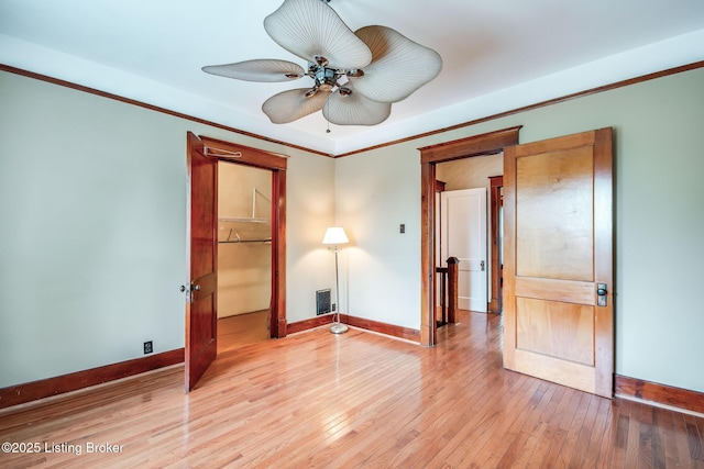 4714 Burkley Ave, Louisville, KY 40214 - unfurnished bedroom featuring light wood finished floors, baseboards, and ornamental molding