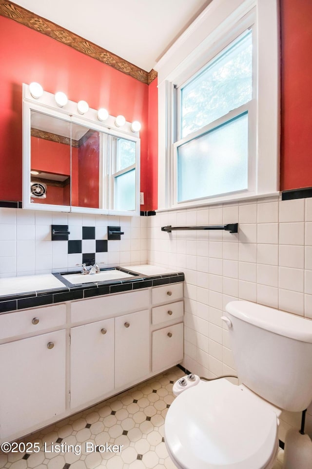 4714 Burkley Ave, Louisville, KY 40214 - bathroom featuring vanity, toilet, and tile patterned floors