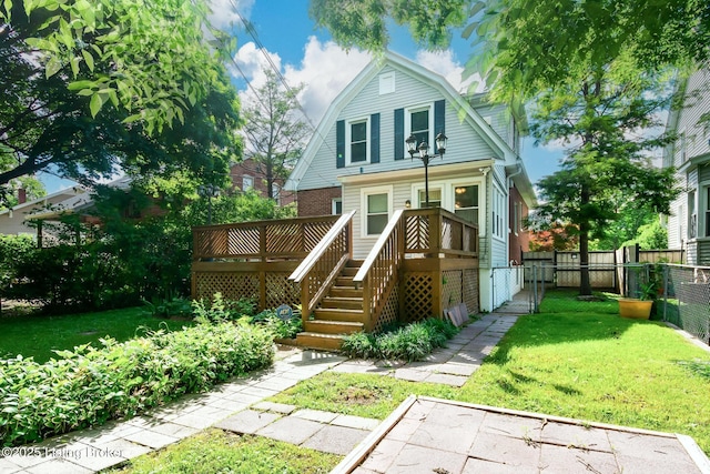 4714 Burkley Ave, Louisville, KY 40214 - back of house featuring a gambrel roof, a deck, and stairs