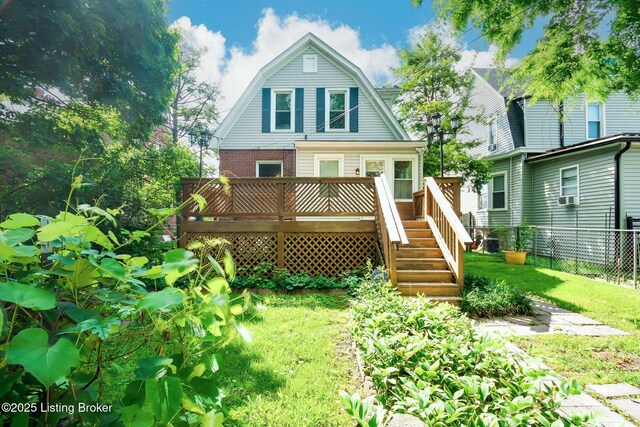 4714 Burkley Ave, Louisville, KY 40214 - back of house featuring a gambrel roof, a deck, brick siding, and cooling unit