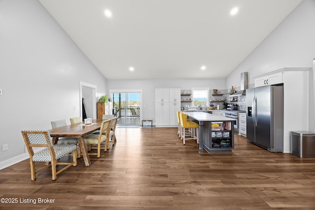 37 Lazy J Ln, Brandenburg, KY 40108 - kitchen with appliances with stainless steel finishes, open shelves, high vaulted ceiling, a kitchen island, and white cabinetry