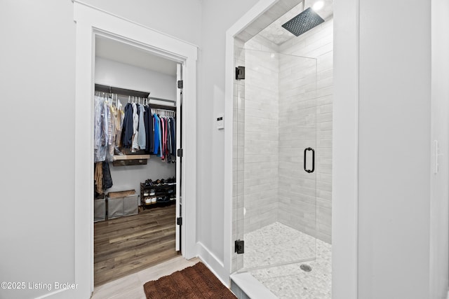 37 Lazy J Ln, Brandenburg, KY 40108 - full bathroom featuring a shower stall, a spacious closet, and wood finished floors