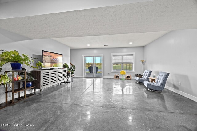 37 Lazy J Ln, Brandenburg, KY 40108 - sitting room featuring baseboards, finished concrete floors, and a textured ceiling