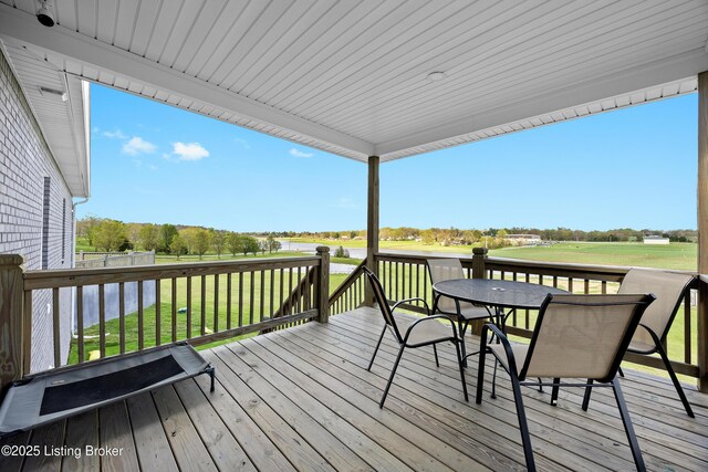 37 Lazy J Ln, Brandenburg, KY 40108 - wooden deck with outdoor dining area and a water view