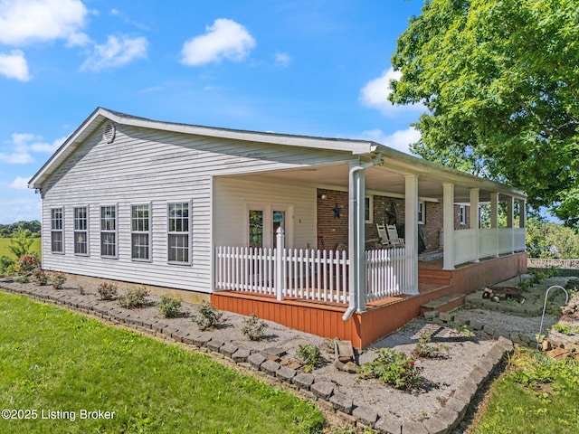 13429 Anneta Rd, Leitchfield, KY 42754 - view of front facade featuring covered porch