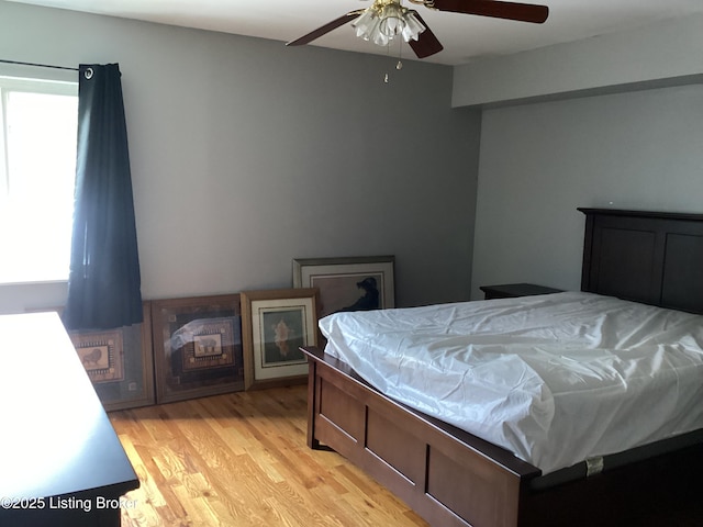 1815 Gardiner Ln Unit A9, Louisville, KY 40205 - bedroom with light wood-style flooring and ceiling fan