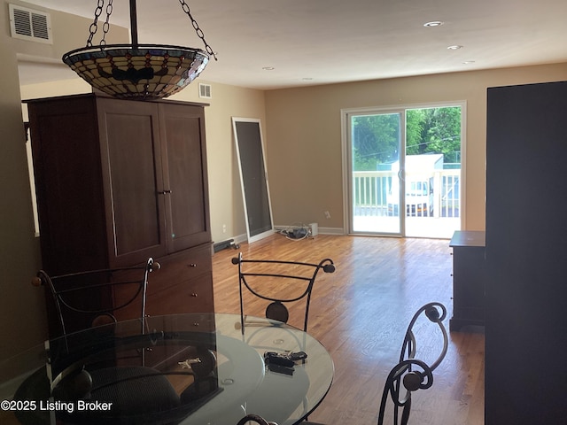 1815 Gardiner Ln Unit A9, Louisville, KY 40205 - dining area with light wood finished floors, baseboards, and recessed lighting