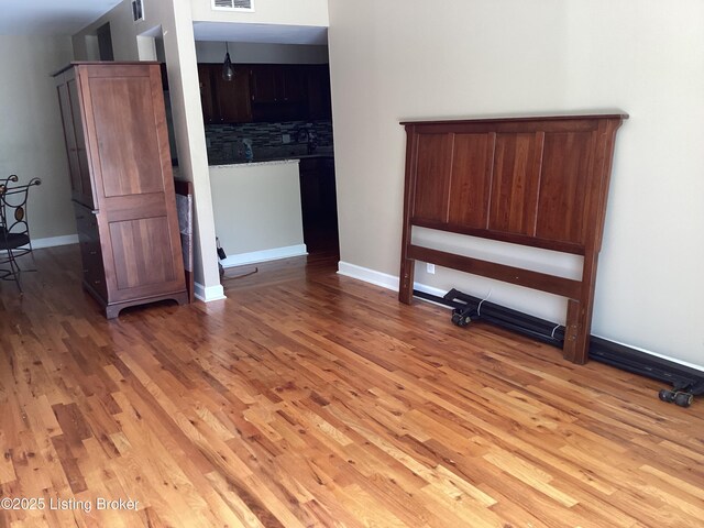 1815 Gardiner Ln Unit A9, Louisville, KY 40205 - unfurnished room featuring light wood finished floors and baseboards