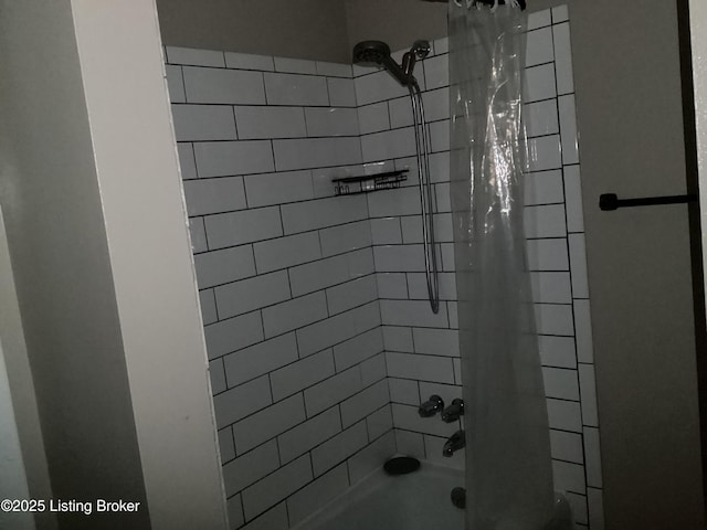 1815 Gardiner Ln Unit A9, Louisville, KY 40205 - bathroom featuring shower / bathtub combination with curtain