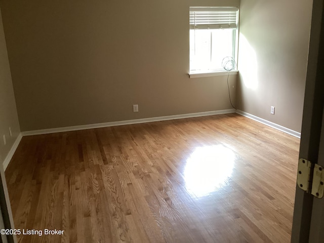 1815 Gardiner Ln Unit A9, Louisville, KY 40205 - empty room with wood finished floors and baseboards