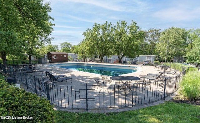 1815 Gardiner Ln Unit A9, Louisville, KY 40205 - community pool with a patio and an outbuilding