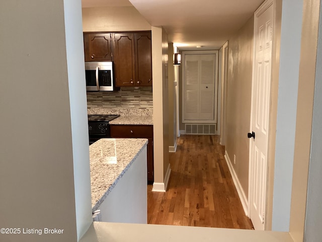 1815 Gardiner Ln Unit A9, Louisville, KY 40205 - hall with light wood-style flooring and baseboards