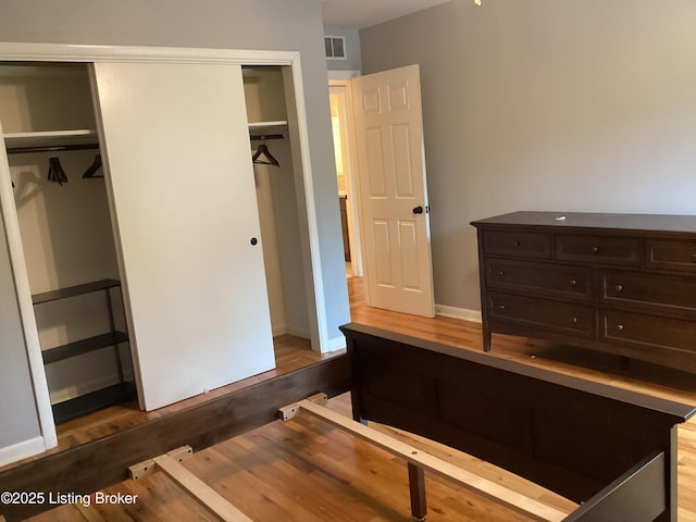 1815 Gardiner Ln Unit A9, Louisville, KY 40205 - bedroom featuring wood finished floors and a closet