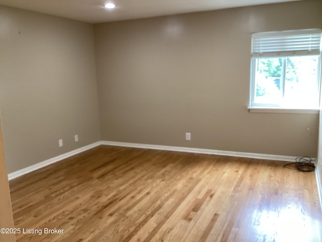 1815 Gardiner Ln Unit A9, Louisville, KY 40205 - empty room featuring wood finished floors and recessed lighting