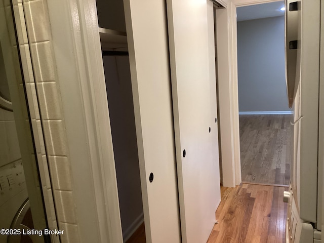 1815 Gardiner Ln Unit A9, Louisville, KY 40205 - corridor featuring wood finished floors and stacked washer / drying machine