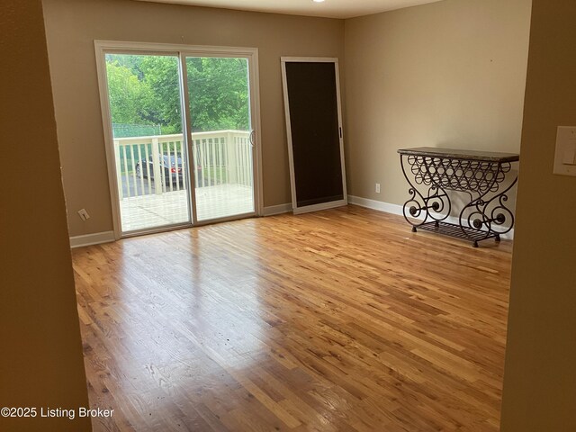 1815 Gardiner Ln Unit A9, Louisville, KY 40205 - unfurnished room featuring wood finished floors and baseboards