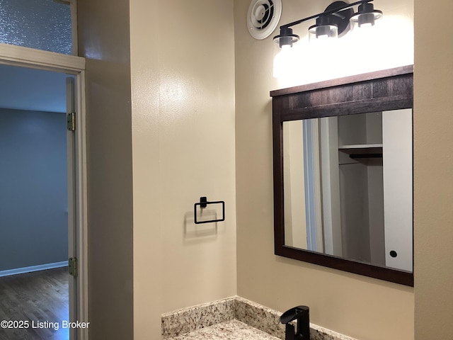 1815 Gardiner Ln Unit A9, Louisville, KY 40205 - bathroom with wood finished floors and baseboards