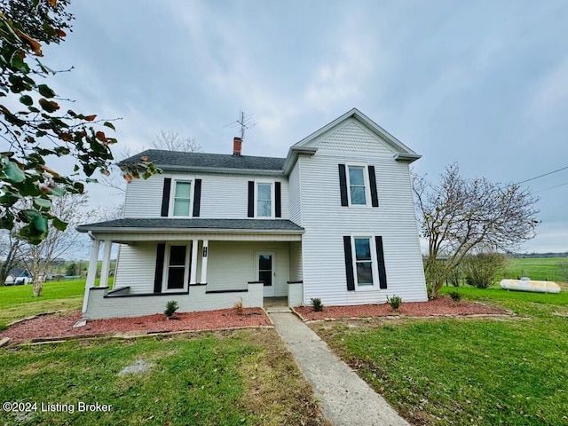 3743 Lincoln Park Rd, Springfield, KY 40069 - victorian-style house featuring a front lawn, a chimney, a porch, and roof with shingles
