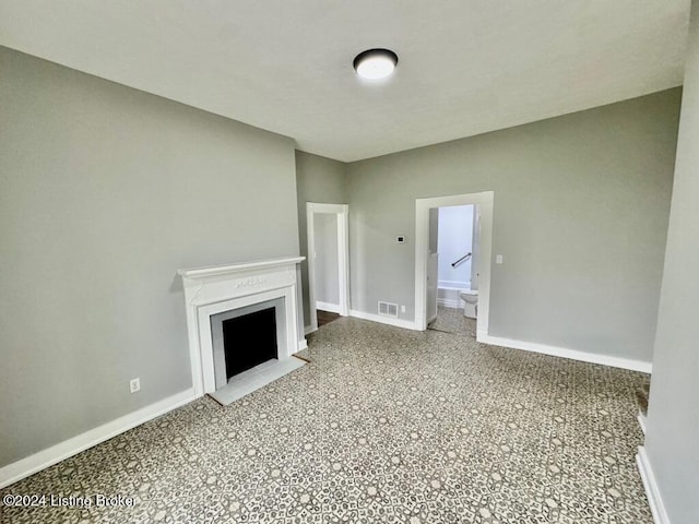 3743 Lincoln Park Rd, Springfield, KY 40069 - unfurnished living room with baseboards and a fireplace with flush hearth
