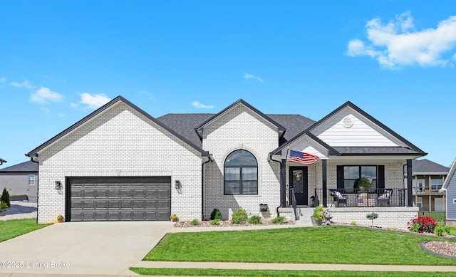 213 Elegance Way, Elizabethtown, KY 42701 - view of front of house with a front yard, brick siding, driveway, and an attached garage