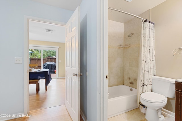 7917 Edsel Ln, Louisville, KY 40291 - bathroom featuring shower / tub combo, toilet, vanity, and baseboards