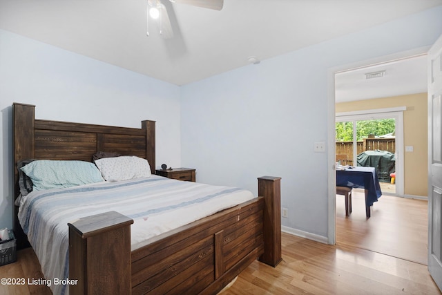 7917 Edsel Ln, Louisville, KY 40291 - bedroom featuring light wood-style floors, a ceiling fan, and baseboards