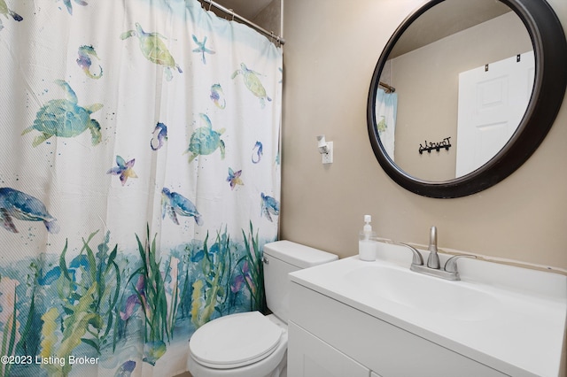 7917 Edsel Ln, Louisville, KY 40291 - full bathroom with toilet, vanity, and a shower with shower curtain