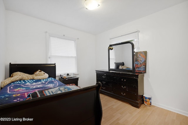 7917 Edsel Ln, Louisville, KY 40291 - bedroom featuring light wood-style flooring and baseboards