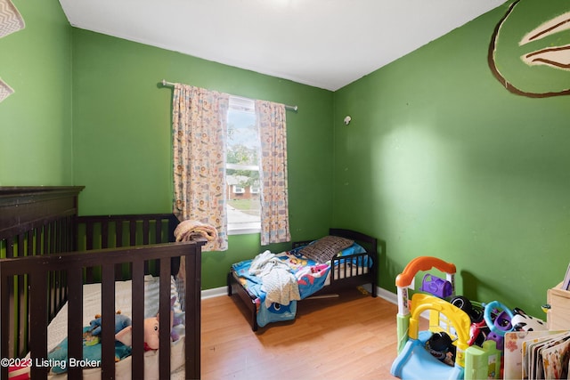 7917 Edsel Ln, Louisville, KY 40291 - bedroom featuring wood finished floors and baseboards