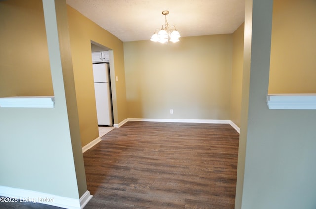 1116 La Fontenay Ct, Louisville, KY 40223 - unfurnished dining area featuring a chandelier, wood finished floors, and baseboards