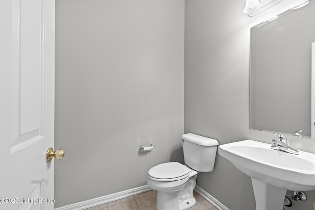 10121 Cave Creek Rd, Louisville, KY 40223 - bathroom featuring baseboards, toilet, and tile patterned flooring