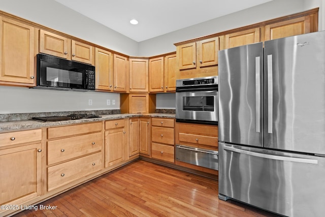 10121 Cave Creek Rd, Louisville, KY 40223 - kitchen with black appliances, a warming drawer, light wood-style floors, light brown cabinetry, and recessed lighting