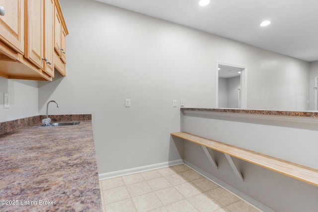 10121 Cave Creek Rd, Louisville, KY 40223 - bar with a sink, recessed lighting, baseboards, and light flooring