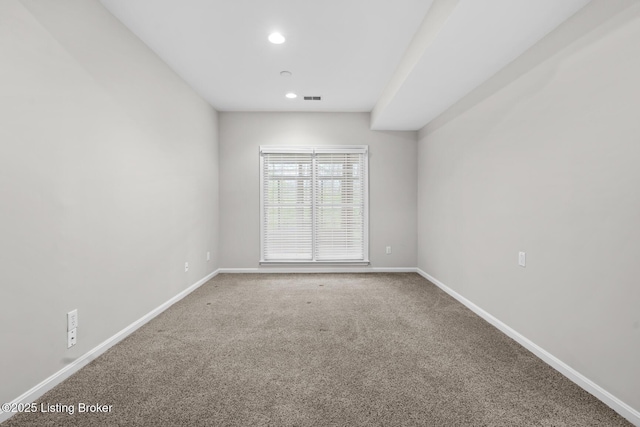 10121 Cave Creek Rd, Louisville, KY 40223 - spare room featuring baseboards, carpet floors, and recessed lighting