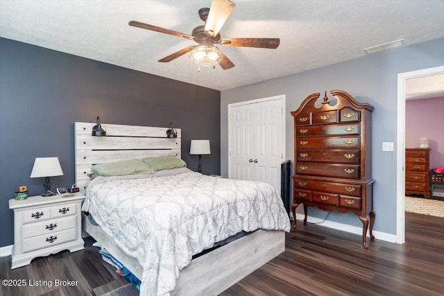 254 Persell Rd, Bedford, KY 40006 - bedroom with wood finished floors, a closet, baseboards, and ceiling fan