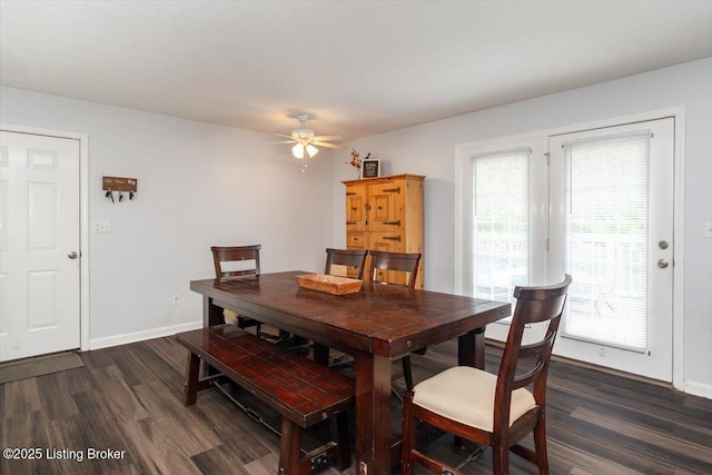 254 Persell Rd, Bedford, KY 40006 - dining area featuring a ceiling fan, dark wood finished floors, and baseboards