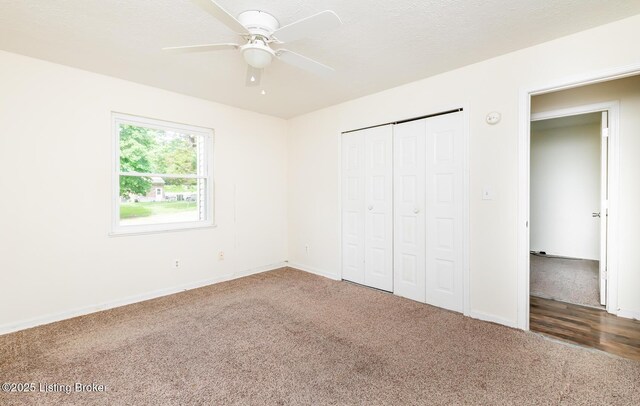 112 Bivins Ct, Radcliff, KY 40160 - unfurnished bedroom with carpet floors, a closet, baseboards, and a ceiling fan