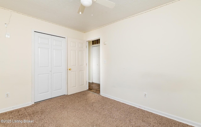112 Bivins Ct, Radcliff, KY 40160 - unfurnished bedroom with carpet flooring, baseboards, a closet, and ceiling fan