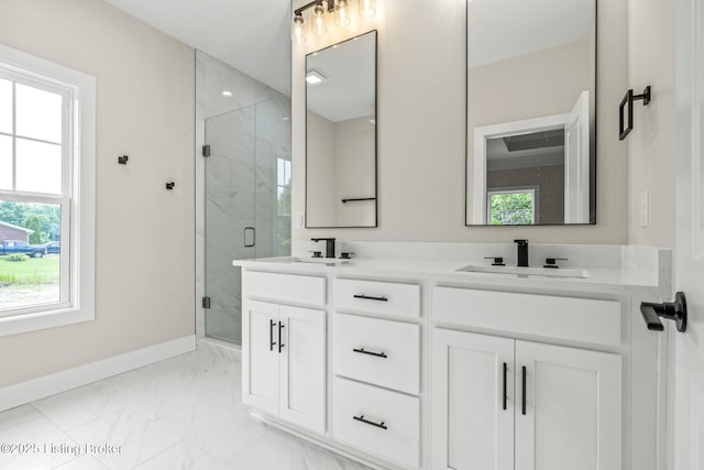 5311 Lee Ave, Crestwood, KY 40014 - full bathroom featuring marble finish floors, baseboards, double vanity, and a marble finish shower