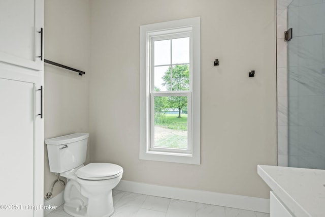 5311 Lee Ave, Crestwood, KY 40014 - full bath featuring toilet, plenty of natural light, baseboards, and marble finish flooring