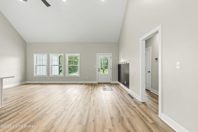 5311 Lee Ave, Crestwood, KY 40014 - unfurnished living room with ceiling fan, light wood finished floors, baseboards, and high vaulted ceiling