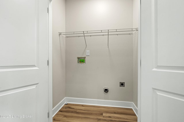 5311 Lee Ave, Crestwood, KY 40014 - laundry room with hookup for an electric dryer, wood finished floors, baseboards, and hookup for a washing machine