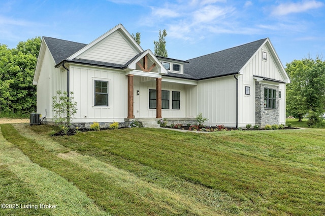 5311 Lee Ave, Crestwood, KY 40014 - modern farmhouse style home featuring board and batten siding, central air condition unit, a front lawn, and a shingled roof