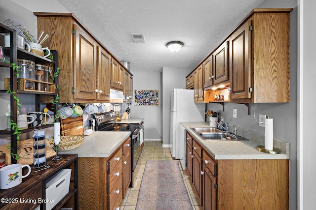 3104 Valleyside Ct, Louisville, KY 40214 - kitchen featuring black electric range, a sink, a textured ceiling, light countertops, and brown cabinetry